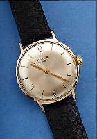 GLASHÜTTE HERRENARMBANDUHR, UM 1966, METALL ROTVERG., BER., EDELST.-BODEN GEDR., KAL. 70,1HANDAUFZUG, RINGUNR., FLACHSPIR., STOßGES., EZW 2, EZG ...