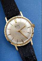 GLASHÜTTE HERRENARMBANDUHR, DEUTSCHLAND UM 1966, METALL GELBVERG., EDELST.-BODEN GEDR., BLATT L. FL., 17 ST., HANDAUFZUGKAL. 70,1, RINGUNR., ...