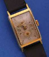 GUB HERRENARMBANDUHR, DEUTSCHLAND UM 1955, REF.-NR. 20210, METALL VERG., EDELST.-BODEN GEDR., IN SICH L. GEW., BLATT FL., FORMANKERW.KAL. 662,2 ...