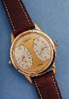ORIS 2-ZEITZONENUHR, SCHWEIZ UM 1965, METALL ROTVERG., BER., EDELST.-BODEN GESCHR., BLATT TEILW. REST., EINGES., 2 VONEINANDER UNABH. ...