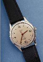 A.S. HERRENARMBANDUHR HAMMERAUTOMATIK, SCHWEIZ/SCHWEDEN UM 1948, EDELST., BODEN GESCHR., BEZ. TäRNAN, SCHR.-UNR., FLACHSPIR., INCABL., ...