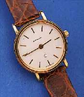 SANDOZ DAMENARMBANDUHR, SCHWEIZ UM 1990, GG 750/000, BODEN GEDR., MINERALFLACHGL., ORIG.-LEDERB. M. STIFTSCHL., HIGH-TECH-QUARTZ-W., UNGETR. ...