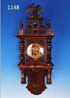WANDUHR, GUSTAV BECKER UM 1910, SOG. FREI- SCHWINGER, VERZIERTES HOLZGEHäUSE, ORIG. AUF- SATZ, 3-SEITIG VERGLAST, PAPIERZIFFERNRING, SKEL. ...