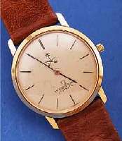 UNIVERSAL GENEVE HERRENARMBANDUHR AUTOMATIK, REF.-NR. 266111, SCHWEIZ UM 1965, GG 750/000,BODEN U. GLASR. GEDR., VERS. BLATT M. SONDER- AUFDR., ...