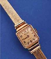 DOM WATCH DAMENGOLDBANDUHR, SCHWEIZ UM 1950,RG 750/000-GEH. INCL. FLECHTB., BLATT VERS., FORMANKERW., 15 ST., HANDAUFZUGKAL. FHF 190, L. CA. 15 ...