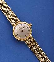 OMEGA DAMENGOLDBANDUHR, REF.-NR. 7173, SCHWEIZ UM 1962, GG 585/000 INCL. GG-BAND, ZEITIDENT. ETUI, BODEN GEDR., VERS. BLATT, AUFGEL. ...