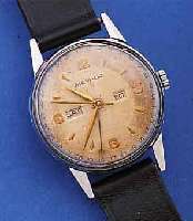 MOVADO HERRENARMBANDUHR CALENDER, REF.-NR. 14816, SCHWEIZ UM 1948, EDELST., BODEN U. GLASR. GEDR., VOLLKALENDER AUßER MONDPHASE, ...