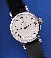 OMEGA DAMENARMBANDUHR, SCHWEIZ/USA UM 1969, WG 585/000 ROD., ORIG.-LEDERB., BODEN GEDR., VERS. KONTRASTZIFFERBL., RUNDANKERW., HANDAUF-ZUGKAL. 620, ...