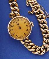 OPTIMA DAMENGOLDBANDUHR, SCHWEIZ UM 1935, GG 585/000 INCL. GG-BAND M. SICHERHEITSSCHL., BLATT VERG., ALTERSBED. FARBL. GET., BRüCKEN- ANKERW. ...