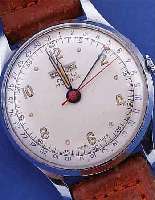 PIERCE WATCH CO/ASU HERRENARMBANDUHR, SCHWEIZ UM 1948, METALL VERCHR., EDELST.-BODENU. GLASR. GEDR., VOLLKALENDER AUßER ...