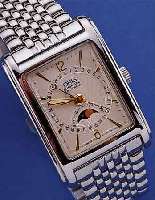 ORIS HERRENARMBANDUHR AUTOMATIK VOLLKALENDER, REF.-NR. B7460, SCHWEIZ UM 1995, EDELST. POL., BODEN 4-FACH VERSCHR., RECT.-FORM, BOMB. ...