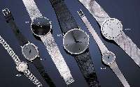 CORUM HERRENGOLDBANDUHR, REF.-NR. 8715/7, SCHWEIZ UM 1970, WG 750/000-GEH. INCL. FLECHT-BAND, BODEN U. GLASR. GEDR., SAPHIRSCHMUCK- KRONE, ...