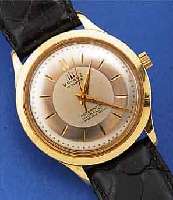 VALRUZ HERRENARMBANDUHR, SCHWEIZ UM 1954, GG 750/000, BODEN GESCHR., 2-FARB. VERS. BLATT, 21 ST., ZENTRALROTOR, WERK VERG., BASISKAL. ...