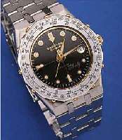 BREITLING HERRENARMBANDUHR QUARTZ/TABARLY, SCHWEIZ UM 1985, EDELST., EDELST.-BAND M. SICHERHEITSFALTSCHL., MINERALFLACHGL., LüNETTEM. ...