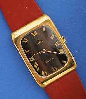 OMEGA HERRENARMBANDUHR GENEVE, SCHWEIZ UM 1976, MASSIV METALL HARTVERG. (BER.), EDELST.- BODEN GEDR., MAßE CA. 42 X 30 MM, KUNSTSTOFF- BAND, ...