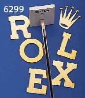 KONVOLUT: ROLEX WERBETRÄGER, 1 X PRÄSENTA- TIONSSTÄNDER, 1 X SCHRIFTZUG BESTEHEND AUS BUCHSTABEN U. KRONE, ALLE TEILE VERKRATZT