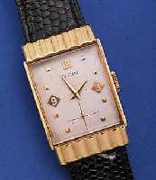 ELGIN HERRENARMBANDUHR, USA UM 1940, GG-FILLED, BODEN GEDR., VERS. BLATT, ALTERS- BED. FARBL. GET., 21 ST., FORMANKERW., KAL. 670, ...