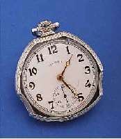 ILLINOIS/CRITERION HERRENTASCHENUHR, USA UM 1925, WG-FILLED, AUFWEND. FORM, BLATT REST., 17 ST., BRüCKENANKERW., VERSCHR. CHATONS, RG-RäDER, ...