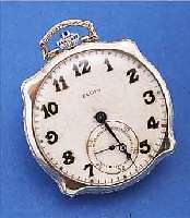 ELGIN HERRENTASCHENUHR LEPINE, USA UM 1925, WG-FILLED, AUFWEND. FORM, RAND WIE BüGEL TEIL-RELIEF., VERS. BLATT L. FL., BODEN U. GLASR. GEDR., 17 ...