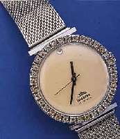JOWISSA HERRENSCHMUCKUHR, SCHWEIZ UM 1990, METALL VERCHR., EDELST.-FLECHTB., LüNETTE AUF-WEND. M. SCHMUCKSTEINBES., WIE BEI 12, BODEN GEDR., 17 ...