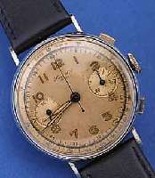 HUGA SA ARMBANDCHRONOGRAPH, SCHWEIZ UM 1940, METALL VERCHR., EDELST.-BODEN U. GLASR. GEDR., VERS. ORIG.-BLATT, ALTERSBED. FL., ...
