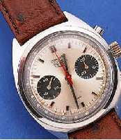 HEUER-LEONIDAS ARMBANDCHRONOGRAPH CARRERA, SCHWEIZ UM 1969, EDELST., BODEN GESCHR., 30- MIN.-STOPPZäHLER, TACHYMETERAUßENSKALA, 17 ST., ...