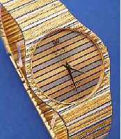 RAYMOND WEIL HERRENARMBANDUHR, SCHWEIZ UM 1985, METALLGEH. U. BAND HARTVERG., HIGH- TECH-QUARTZW., DESIGN VON BAND IM LüNETTE U. ZIFFERBL. ...