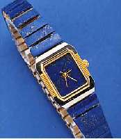 DAMENARMBANDUHR, UM 1990, ZIFFERBL. U. BANDOBERFL. M. LAPISLAZULI BEL., METALL TEILW.VERG., MINERALFLACHGL., QUARTZW. M. SEK.-TAKT,BEI ...