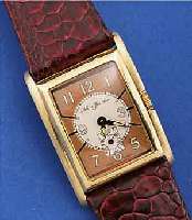 NUMA JEANNIN ARMBANDUHR, SCHWEIZ, GG 750/000GEH. UM 1937, BODEN GEDR., NUTZSP. üBERARB., WERK U. ZIFFERBL. AUS AKTUELLER PRODUKT., 17 ST., ...