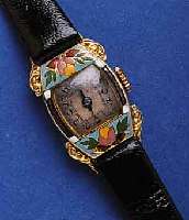 ESKAESKA DAMENARMBANDUHR, SCHWEIZ UM 1935, ART DECO, GG 750/000, LÜNETTE GOLDEMAIL. L. BESCH. ORIG.-BLATT VERS., FL., 15 ST., HANDAUFZUGKAL. ...