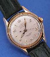 BUTEX HERRENARMBANDUHR AUTOMATIK, REF.-NR. 710, SCHWEIZ UM 1954, RG 750/000, BODEN GE- SCHR., BLATT U. ZEIGER REST., 17 ST., ZENTAL- ROTOR, ...