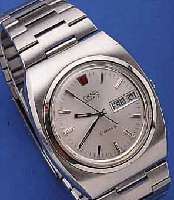 OMEGA HERRENARMBANDUHR QUARTZ GENEVE, SCHWEIZ UM 1975, EDELST. INCL. ORIG.-EDELST.- BAND, TAG U. DATUM M. SCHNELLKORREKTUR, KAL. 1310, ...