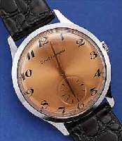 GIRARD PERREGAUX HERRENARMBANDUHR, SCHWEIZ UM 1952, METALL HARTVERCHR., EDELST.-BODEN U. GLASR. GEDR., BLATT REST., 17 ST., RUNDANKERW.NR. 0300340, ...