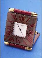 CARTIER REISEWECKERCHEN IM ORIGINALETUI, SCHUTZHüLLE, AUFSTELLB., HIGH-TECH-QUARTZW., MASSIV MESSING, SCHWEIZ UM 1985, BRONZEFARB. LACKIERT, ...