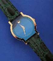 MOVADO DAMENARMBANDUHR MUSEUMS WATCH, AUF- WEND. GEH. HARTVERG., EDELST.-BODEN 4-FACH VERSCHR., BOMB. SAPHIRGL., HIGH-TECH-QUARTZ- W., UNGETR. ...