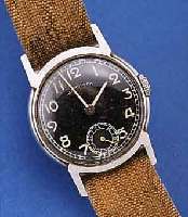 HAMILTON HERRENARMBANDUHR, USA UM 1940, EDELST., BODEN GEDR., KONTRASTZIFFERBL. FL., FORMANKERW., HANDAUFZUGKAL. 980, SCHR.-UNR., BREG.-SPIR., ...