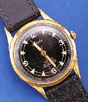 MAUTHE HERRENARMBANDUHR, RESERV. FüR VW, SO SONDERGRAV. AUF GEH.-BODEN FüR HOHE KILOME-TERLEISTUNG, DEUTSCHLAND UM 1958, METALL HART-VERG., ...