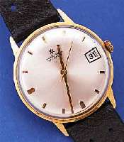 JUNGHANS HERRENARMBANDUHR, DEUTSCHLAND UM 1970, GG 585/000, BODEN GEDR., ZENTRALSEK., DATUM, AUF BODEN JUBILäUMSGRAV. (RUHRKOHLE AG 25 ...