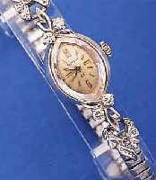 BULOVA DAMENARMBANDUHR, WG 585/000, KORDEL- BANDANST. M. DIAMANTBES., METALLZUGGLIEDERB. M. WG-AUFL., BODEN GEDR., VERS. BLATT FL., FORMANKERW., ...