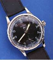 OMEGA MILITäRARMBANDUHR, FüR D. BRIT. ARMEE,SCHWEIZ UM 1949, EDELST., BODEN VERSCHR., ORIG.-OMEGA-LEDERB. M. STIFTSCHL. SPäTER, ...