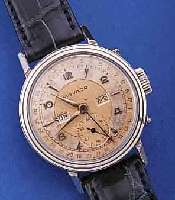 MOVADO HERRENARMBANDUHR VOLLKALENDER AUßER MONDPHASE, EDELST., BODEN GESCHR., SCHWEIZ UM 1949, VERS. BLATT FL., KORREKTURDR. SEITL. IM GEH. ...