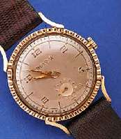 BULOVA HERRENARMBANDUHR, USA UM 1950, GG- FILLED, LüNETTE SCHMUCKGEPR., BODEN GEDR., ORIG. VERS. BLATT ALTERSBED. FL., KL. SEK. VERT., ...
