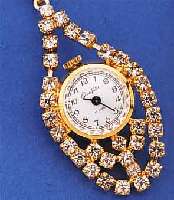 KONVOLUT: 2 GLASHÜTTE ANHäNGEUHREN, METALL M. STRAß BES., VERSCH. DESIGN (1X GELB, 1X WEIß VERG.), UNGETR. LAGERW., EHEM. DDR-PRO- DUKTION ...