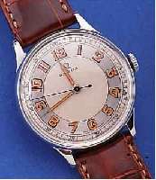 OMEGA HERRENARMBANDUHR, SCHWEIZ UM 1949, EDELST., BODEN U. GLASR. GEDR., NUTZSP. üBER- ARB., BLATT REST., AUFWEND. STD.-ZEICHEN M. ...