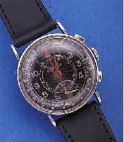 HEUER ARMBANDCHRONOGRAPH, SCHWEIZ UM 1938, EDELST., BODEN U. GLASR. GEDR., BANDANST. OBENAUS REP.-GRüNDEN GEL., ORIG.-BLATT FL., 30- ...