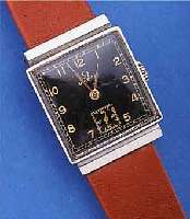 OMEGA HERRENARMBANDUHR, SCHWEIZ UM 1940, EDELST., CARREE-GEH., TEILVERD. BANDANST., BODEN GEDR., AUßER GLAS, BAND U. KRONE ORIG.- ZUST., ...