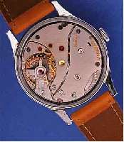 ETERNA HERRENARMBANDUHR, SCHWEIZ 40ER JAHRE,EDELST., BODEN GESCHR., AUßER LEDERB. ORIG.- ZUST., BLATT ALTERSBED. FL., GR. RUNDANKERW., 15 ST., ...