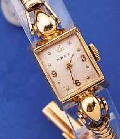 EBEL DAMENGOLDBANDUHR, SCHWEIZ UM 1948, GG 750/000 INCL. GG-SCHLANGENGLIEDERB., SICHERHEITSKETTCHEN, BODEN GEDR., VERS. BLATT,ALTERSBED. ...