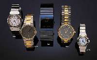 CARTIER DAMENARMBANDUHR SERIE SANTOS AUTOMATIK EDELST.-EINSCHALENGEH., SCHMUCKKRONE, GET. A-WELLE, BEI FERTIGST. WASSERD., LüNETTE U. ...