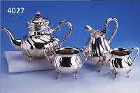 4-TEILIGES KAFFEESERVICE, KOPENHAGEN 1915- 1943, 830ER SILBER, BAROCKSTIL, JE 4 FüßE, BEST. AUS: KANNE, MILCHKäNNCHEN, SAHNGIEßER UND ...